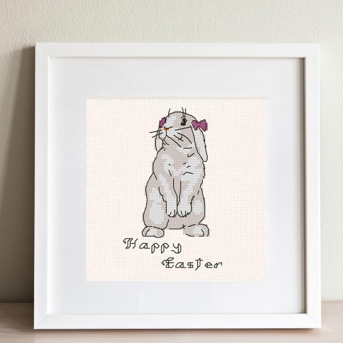 The free printable pdf cross-stitch pattern "Easter Bunny Samanta" in modern style.