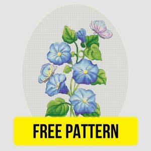 Free cross stitch pattern with blue flowers designed by Tamriko Lamaridze.