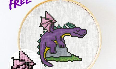 Free cross stitch pattern with a sleeping dragon designed by Julia Strekalova.
