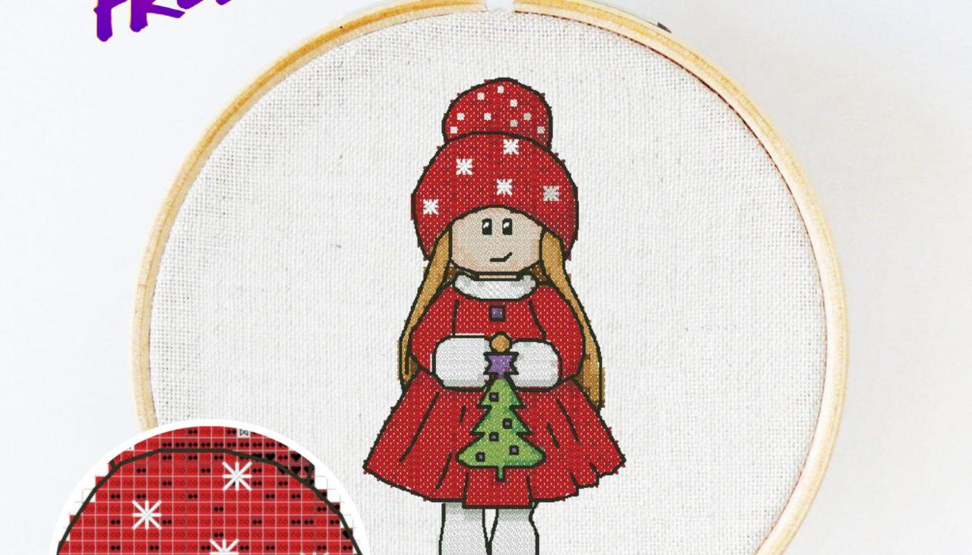 Free cross stitch pattern with a New Year doll designed by Julia Strekalova.