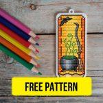Free cross stitch pattern with Halloween magic potion in pencil bookmark design designed by Yulia Leonova.