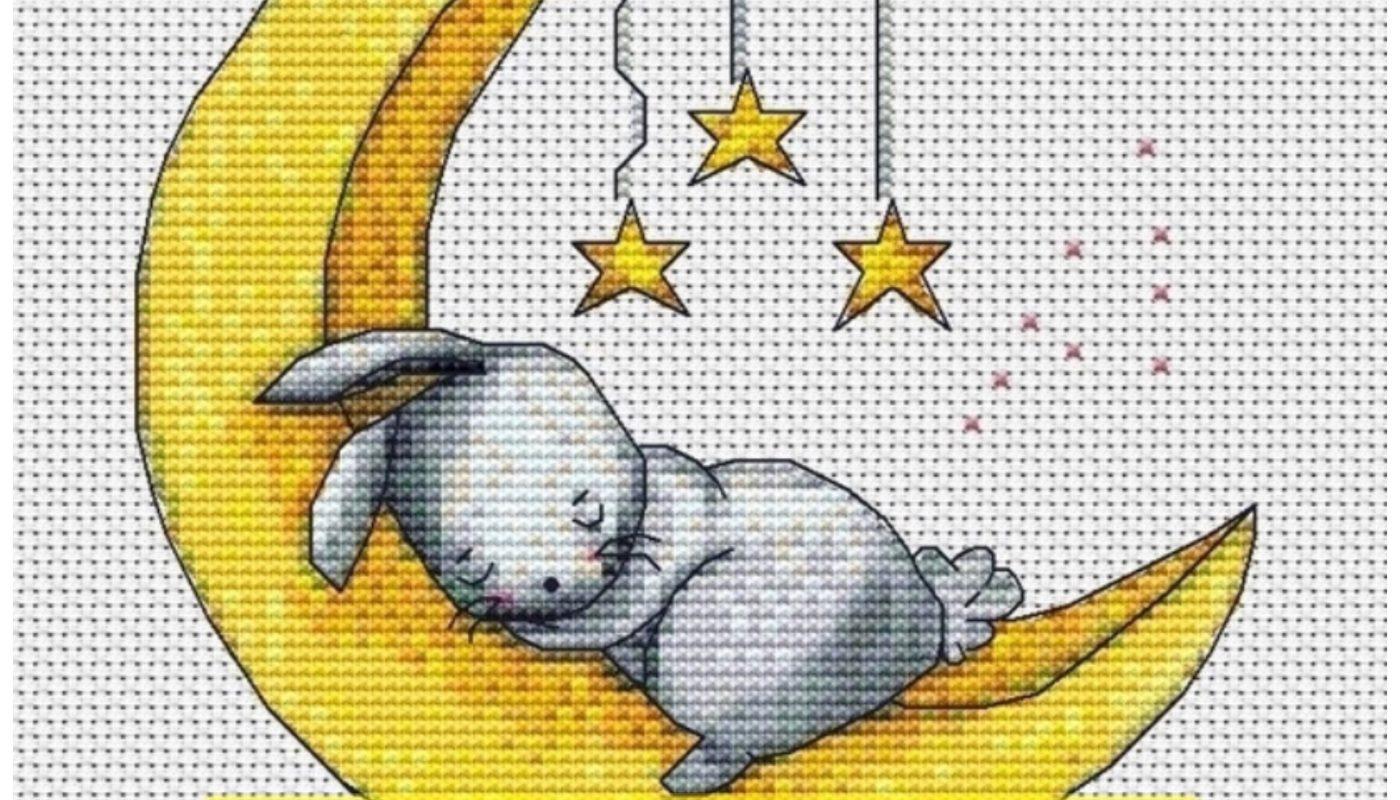 Free cross stitch pattern with a sleeping rabbit designed by TatiYa.