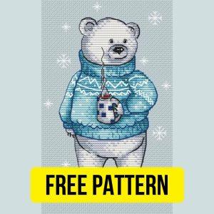 Free cross stitch pattern with a winter bear designed by Tascha Volk.