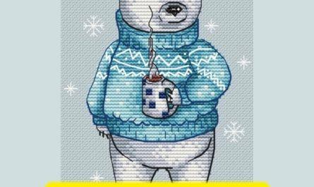Free cross stitch pattern with a winter bear designed by Tascha Volk.