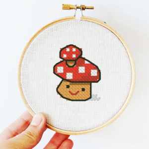 The small cross-stitch pdf printable pattern "Funny mushroom" in modern style.