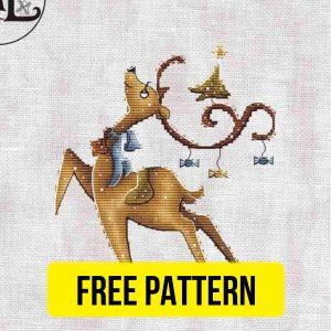 Free cross stitch pattern with a New Year deer designed by Eva Stitch.