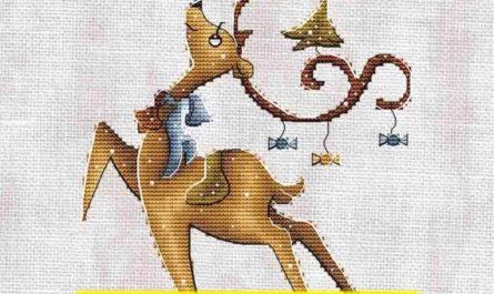 Free cross stitch pattern with a New Year deer designed by Eva Stitch.