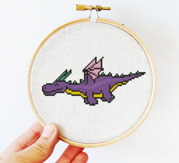 The small cross-stitch pdf printable pattern "Happy Dragon" in modern style.