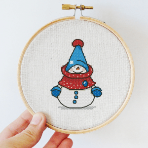 The cross-stitch pdf printable pattern "Snowman" in NewYear/Christmas style.